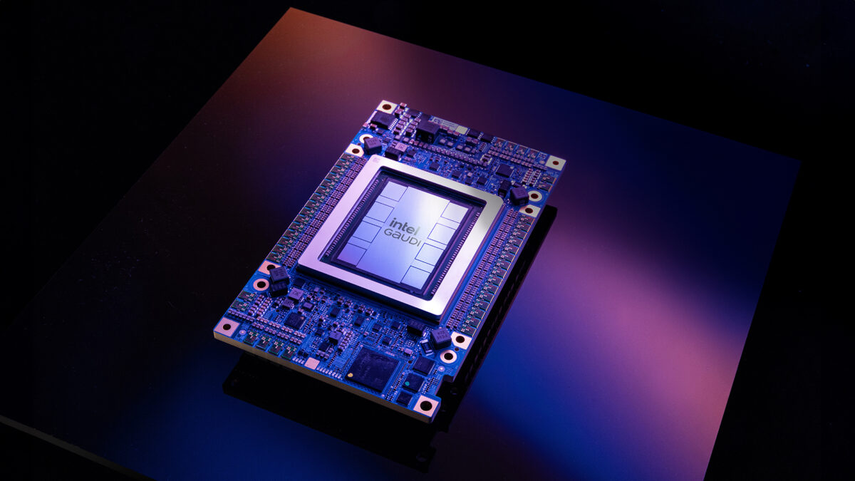 A close-up of an Intel Gaudi2 AI processor chip mounted on a circuit board, displayed on a reflective surface with ambient blue and purple lighting.