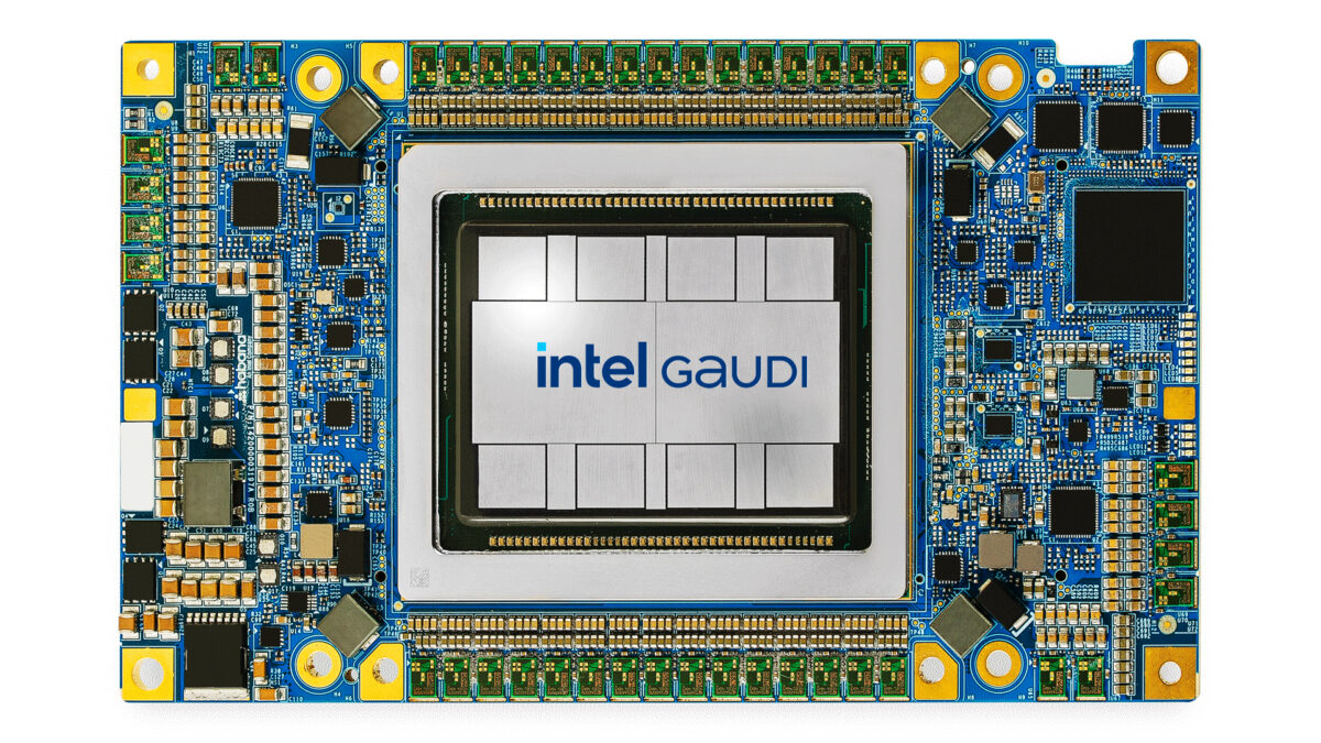 Close-up of an Intel Gaudi processor on a circuit board. The chip is centrally positioned, surrounded by intricate circuitry and small components in blue, yellow, and metallic colors.