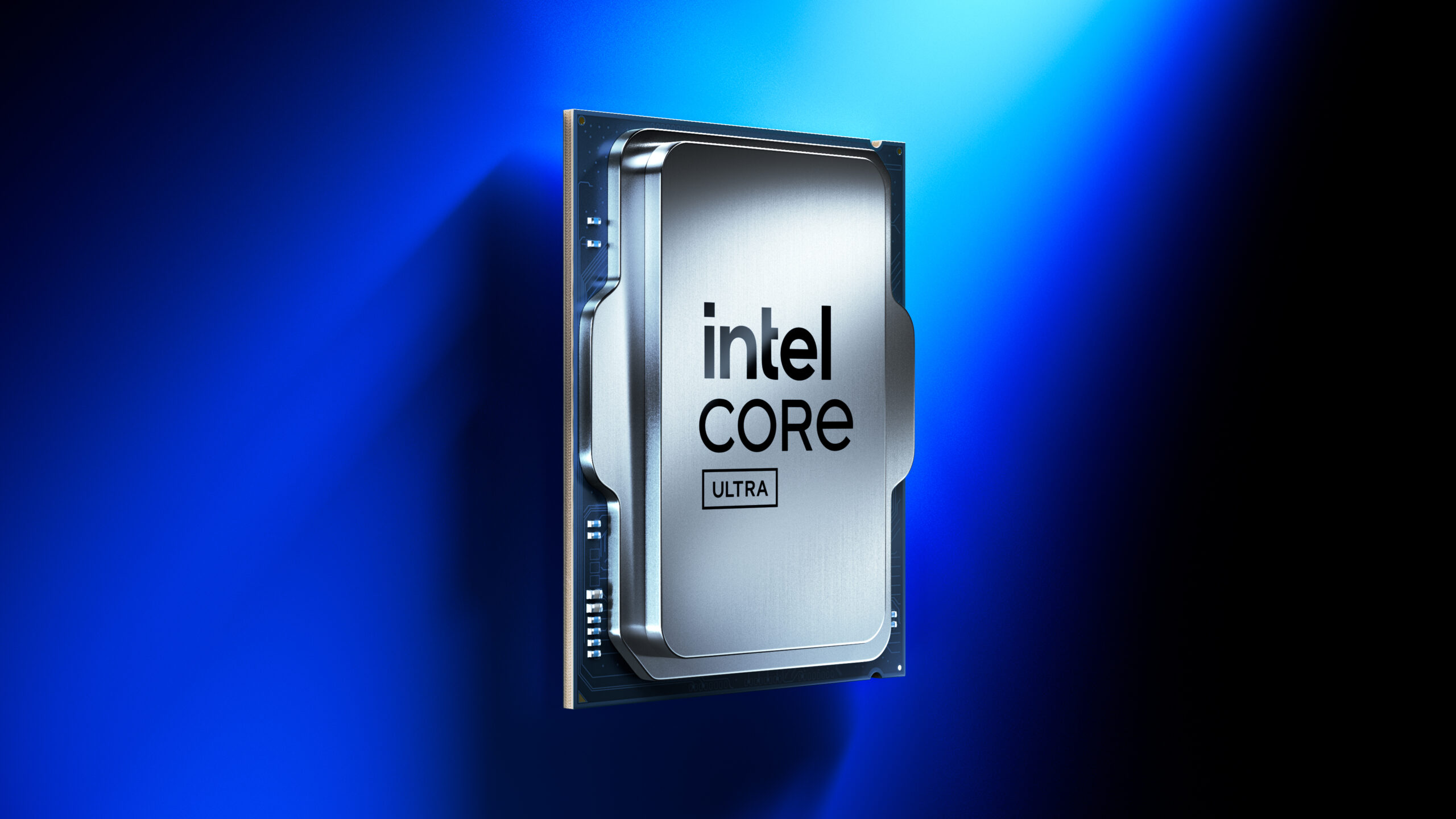 A close-up of an Intel Core Ultra processor chip against a gradient blue background. The chip has Intel Core Ultra printed on it in black text. The design is metallic and sleek, reflecting light in various shades.