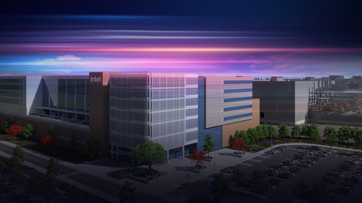 A modern Intel office building at dusk, with a vibrant, colorful sky and light streaks above. The foreground features a parking lot with trees lining the street.